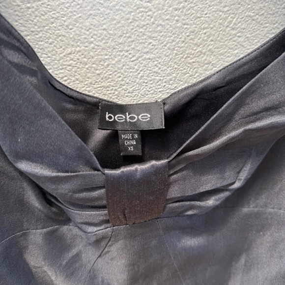 Black Cocktail Bubble Dress with cut out flower design on bottom - Picture 5 of 8